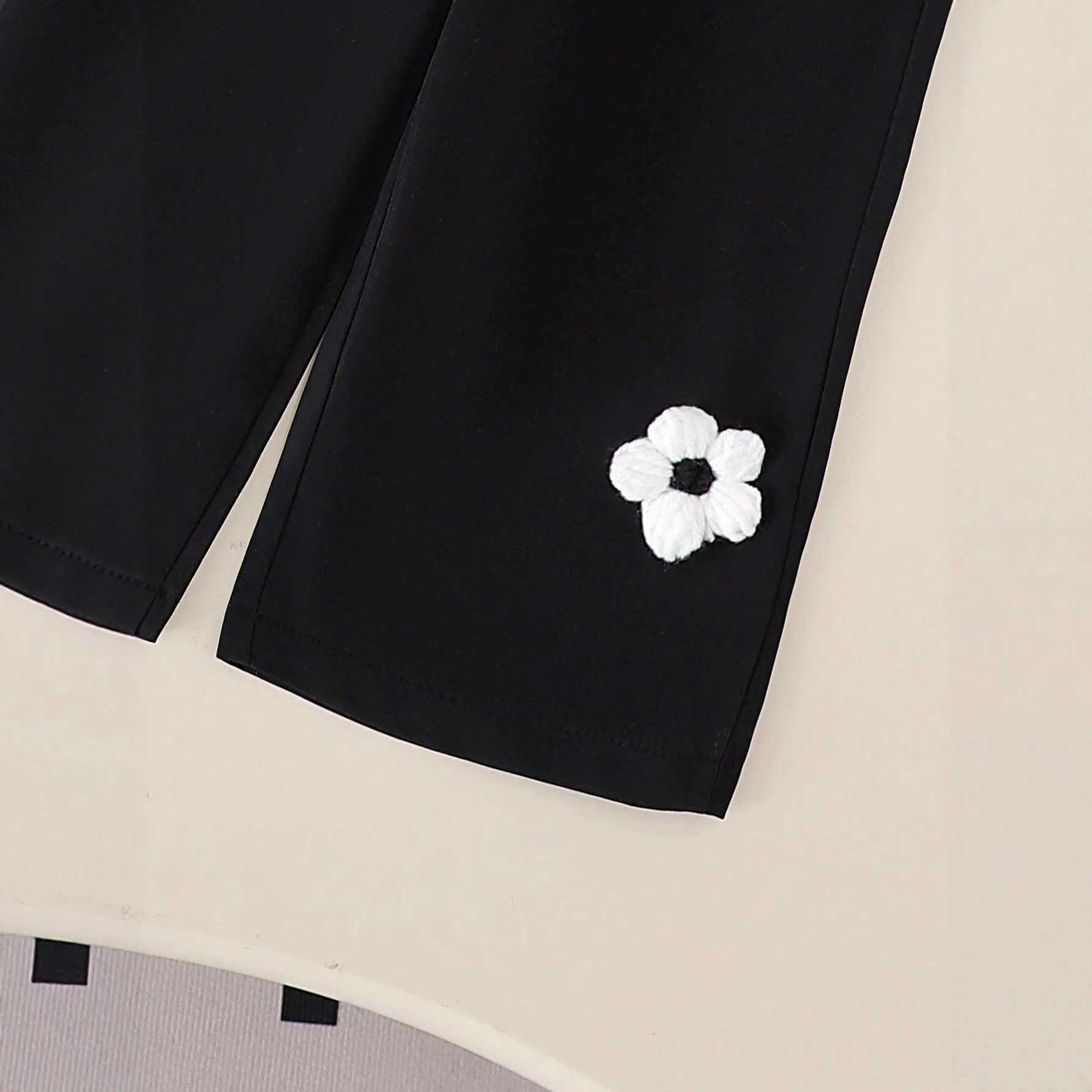 Baby girl cotton outfit set with white long-sleeved wool flower top and black trousers for toddlers 6 months to 3 years
