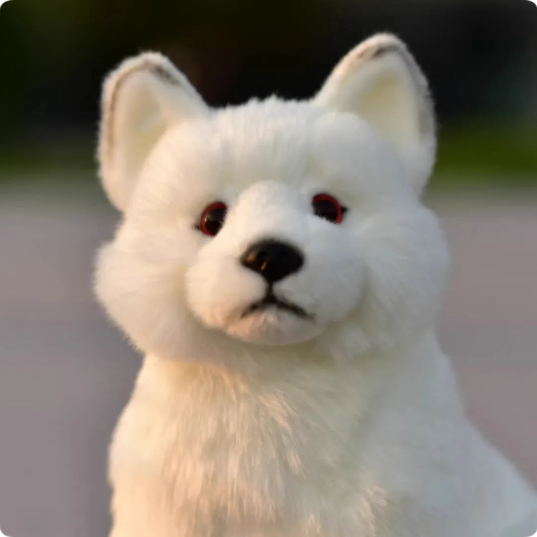 Soft plush toy animal doll approximately 25.5 cm tall in orange red colour, sitting firmly on a white desk surface