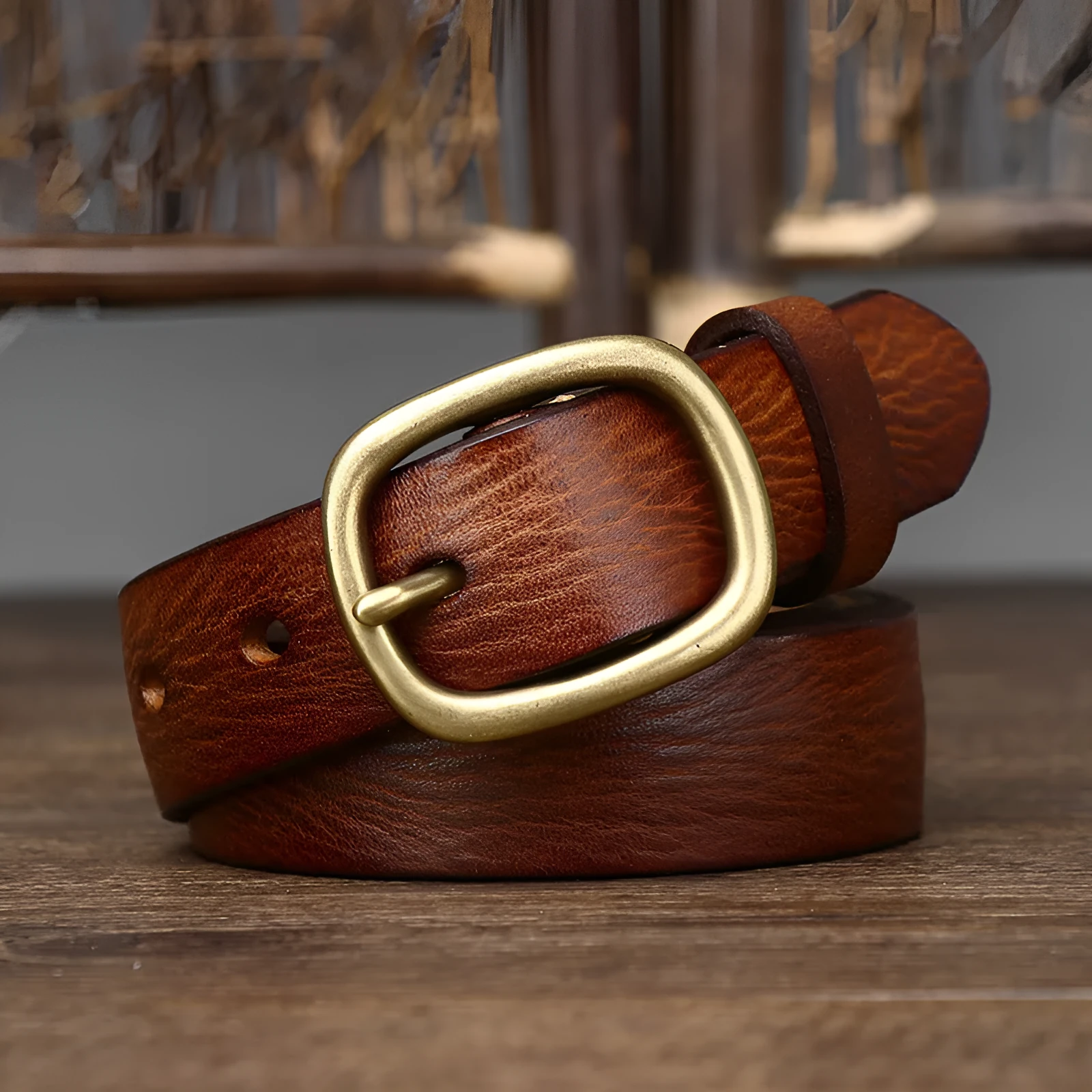 Handmade genuine leather belt with antique copper buckle, 2.8cm wide, 4mm thick, 120cm length, in black colour on wooden surface