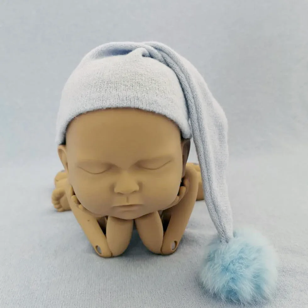 Hand-woven yarn baby photography hat in conical style, available in twelve colour options