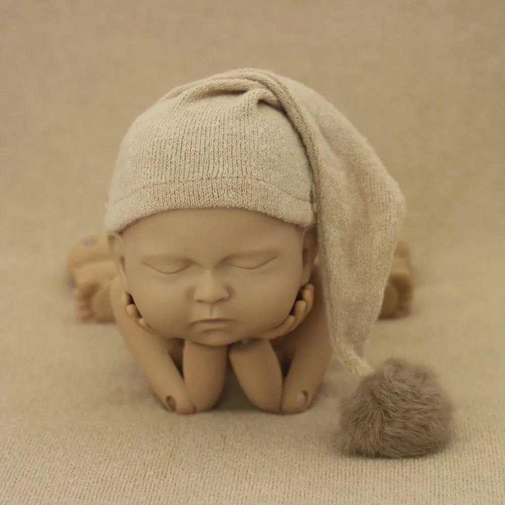 Hand-woven yarn baby photography hat in conical style, available in twelve colour options