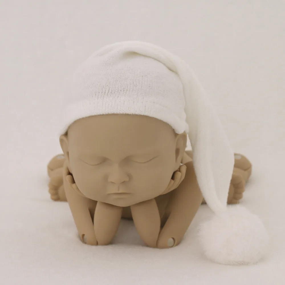 Hand-woven yarn baby photography hat in conical style, available in twelve colour options