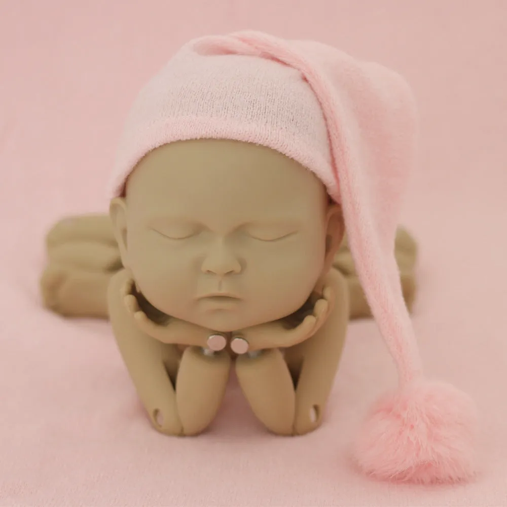 Hand-woven yarn baby photography hat in conical style, available in twelve colour options