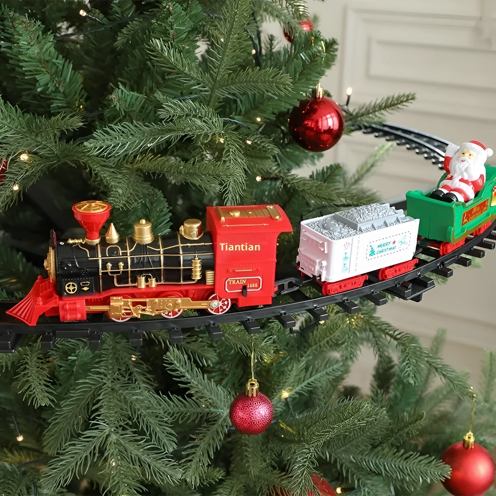 Electric Christmas train hanging decoration plastic rail car in motion on a tree
