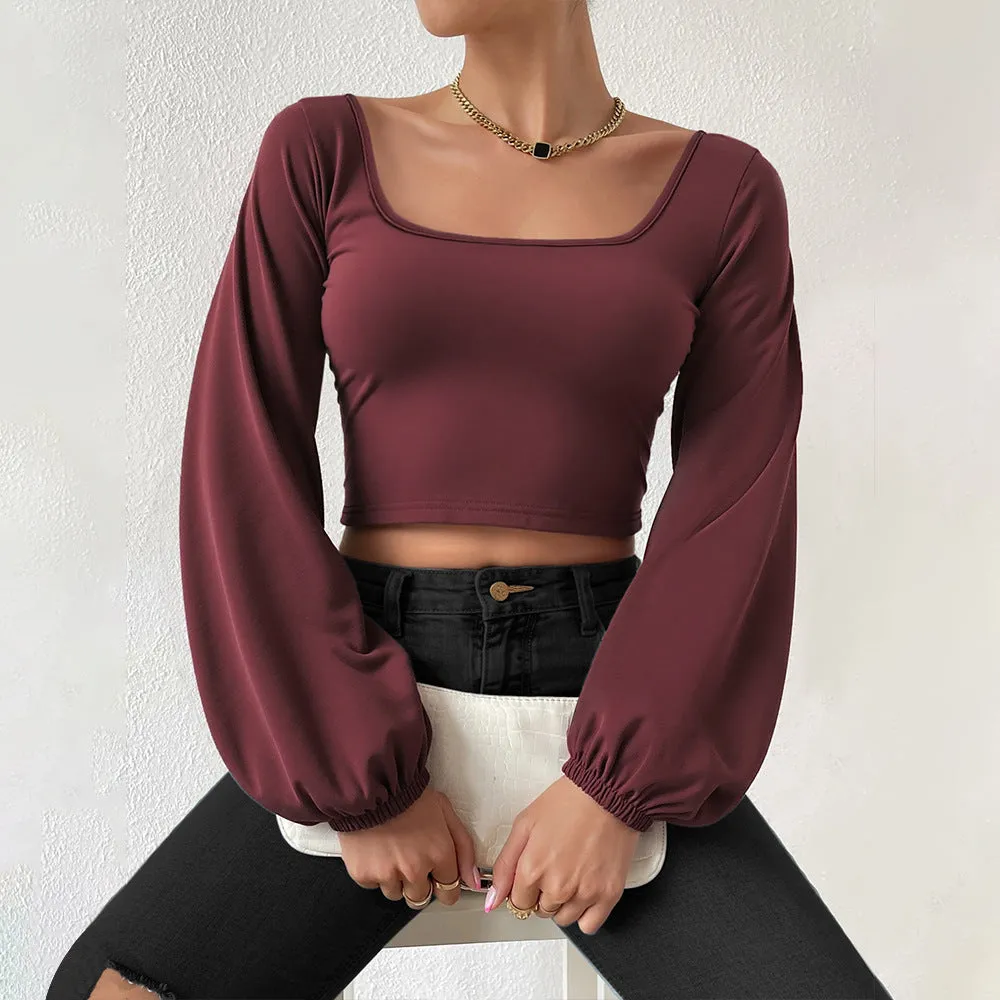 Wine red long-sleeved slim fit shirt with retro lantern sleeves and collage patchwork detail on polyester fabric