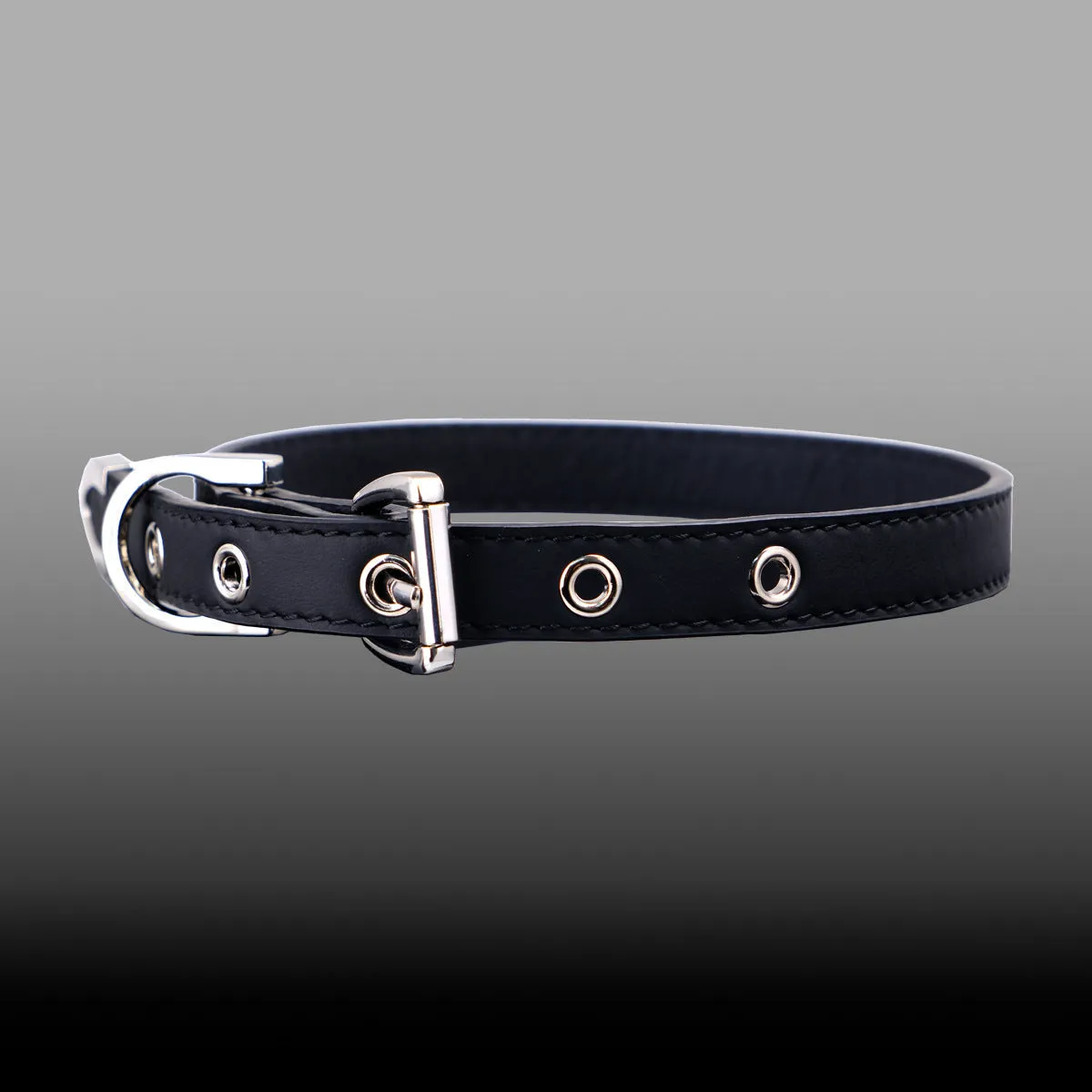 Black leather collar with geometric metal pendant on adjustable chain