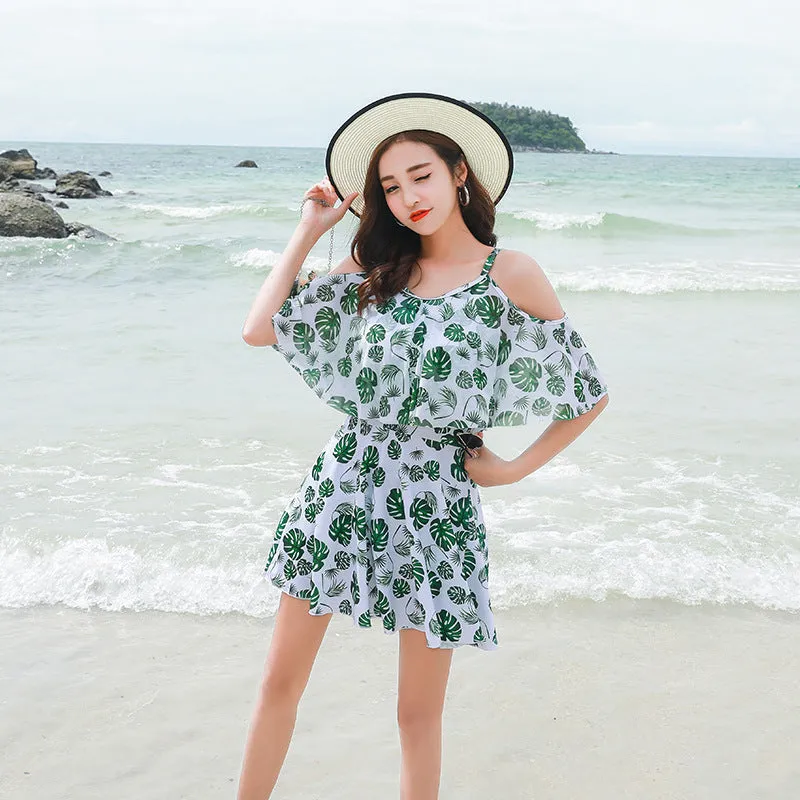 Women's printed one-piece swimsuit in polyester fabric showing green leaf style and black letter style colour options