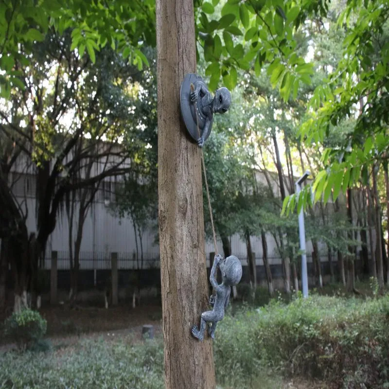 Grey resin alien tree pendant garden decoration with carved pastoral styling