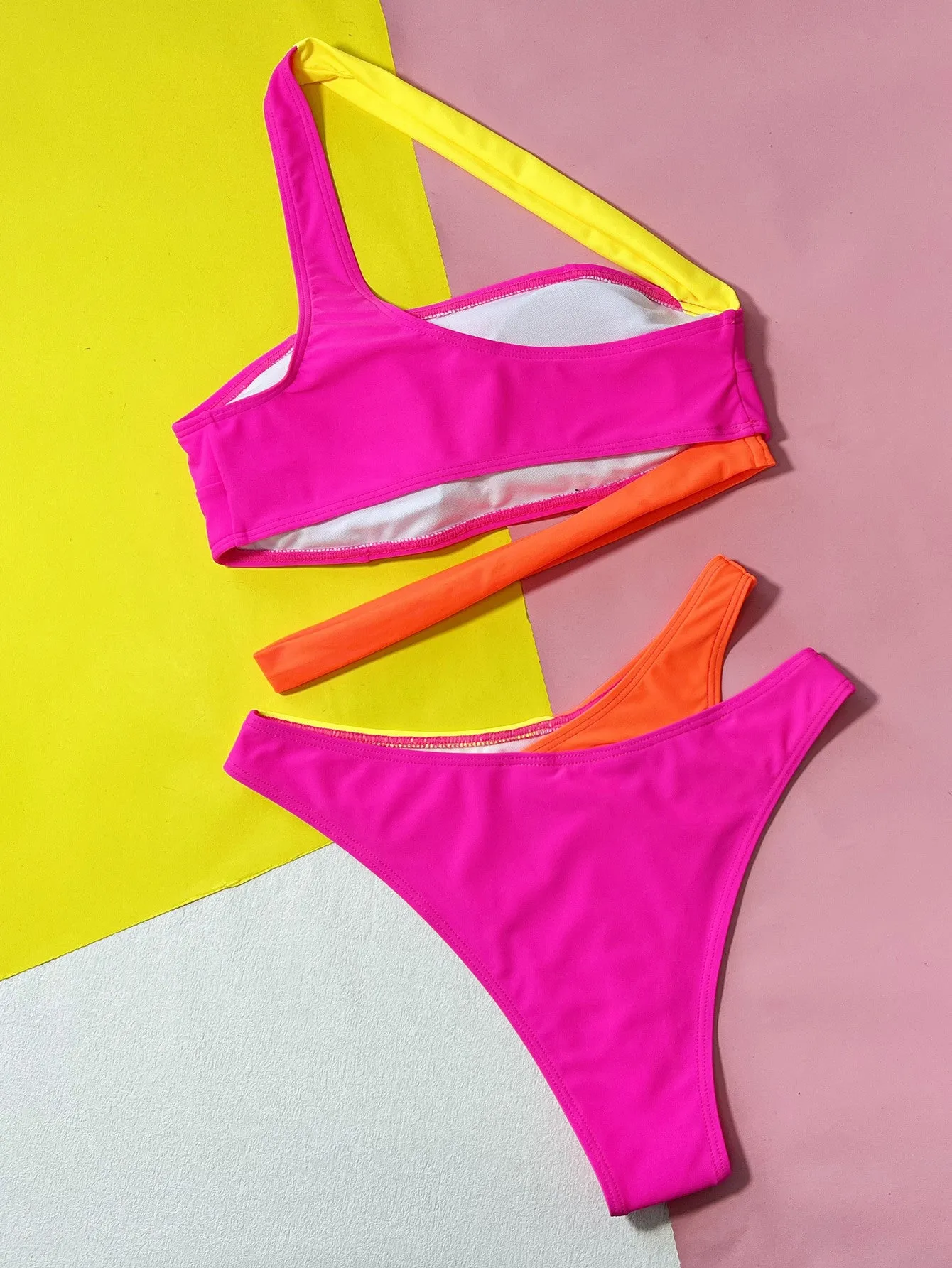 Rose red hollow contrast split bikini swimsuit with briefs style for swimming