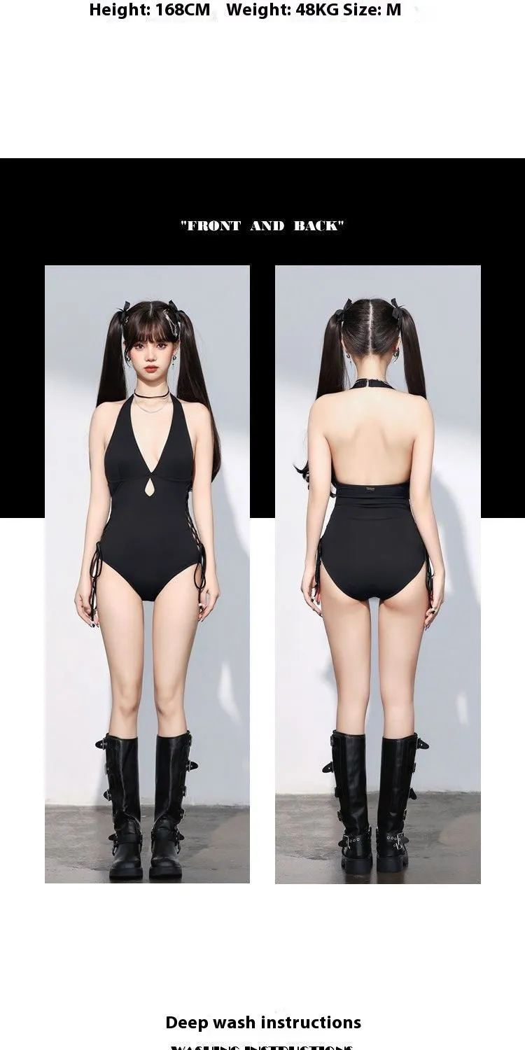 Black women's one-piece swimsuit with V-neck and hollow strap design.