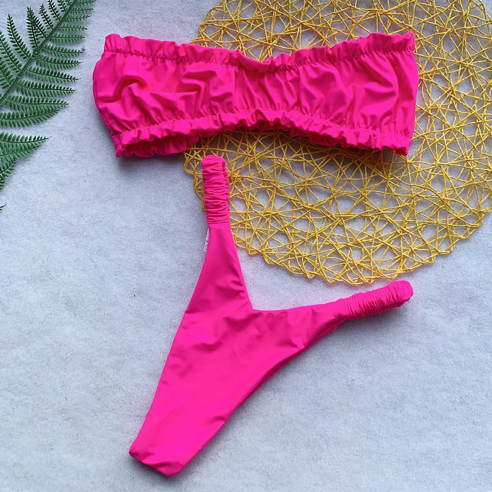 Solid colour women's high-waist bikini with split chest pad in leopard print, green, or red