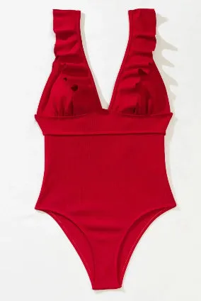 Black one-piece swimsuit for women with ruffled shoulder straps and decorative lace across the back.
