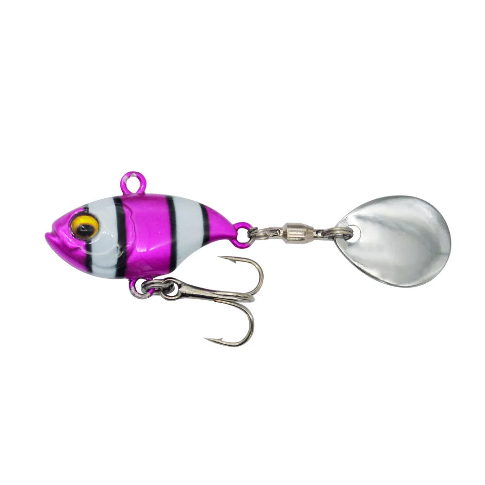 Metal fishing lure with rotating sequins in zebra orange colour pattern.