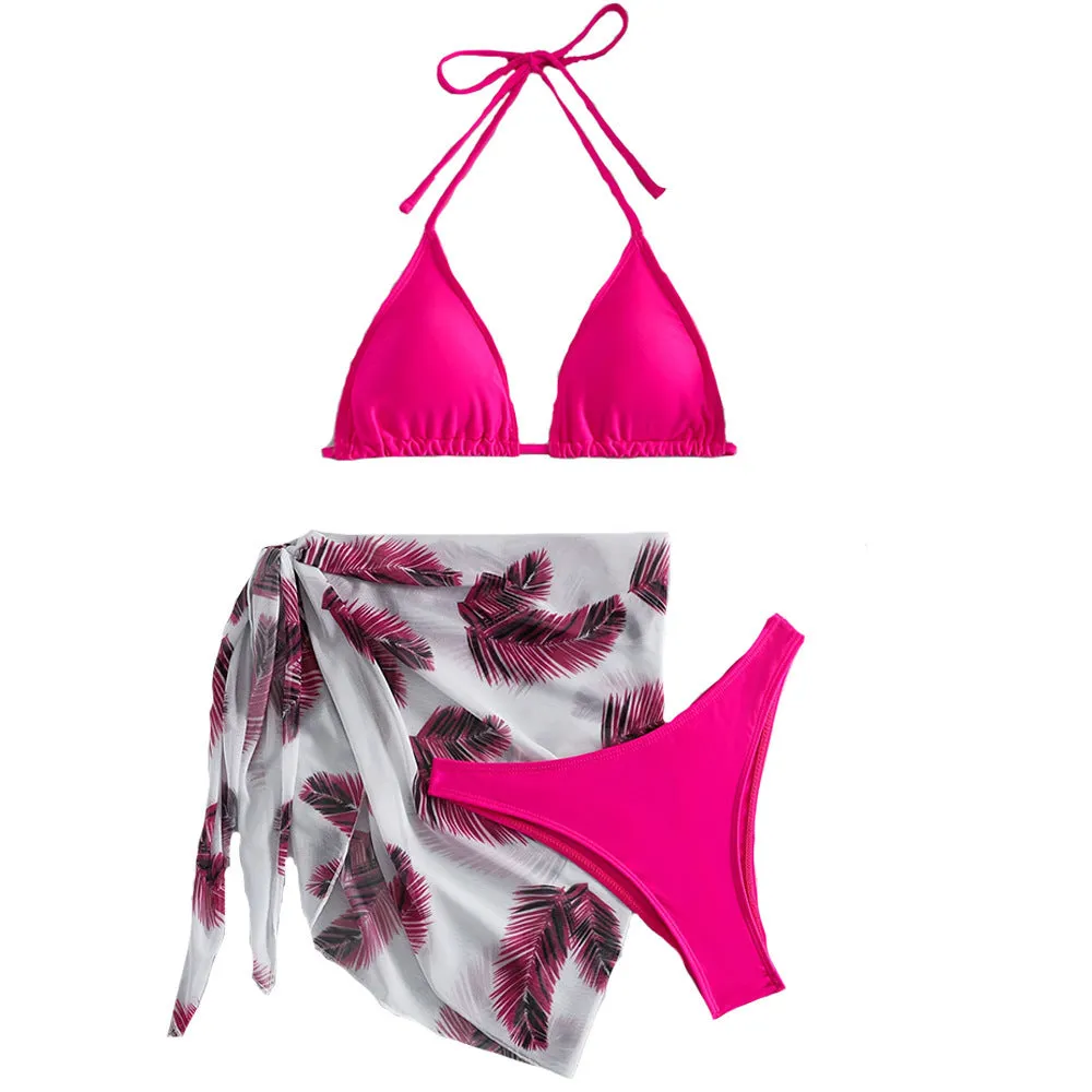 Orange three-piece bikini swimsuit set with a printed gauze skirt on a white background