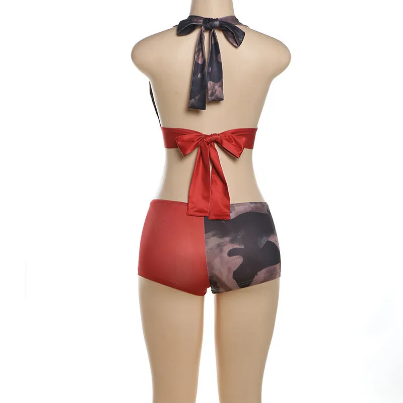 Red women's high waist hip lift shorts and bikini top set with 3D printed pattern.