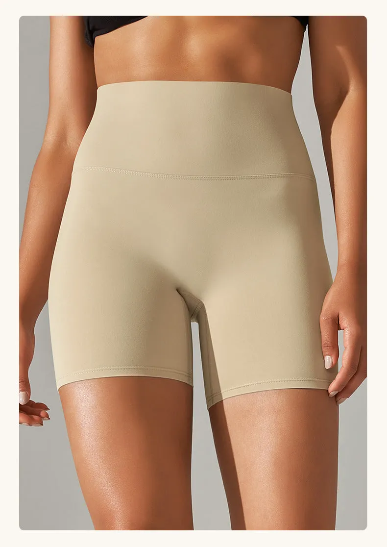 Women's high waist fitness tights in dark green, hip-length cut, for running and gym wear.