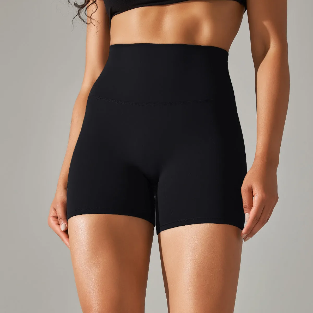 Women's high waist fitness tights in dark green, hip-length cut, for running and gym wear.