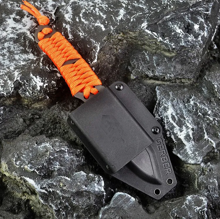 Outdoor straight survival knife with rope-wrapped handle and black ABS plastic sheath