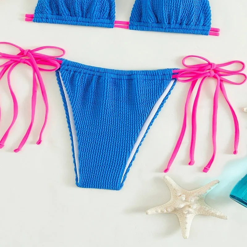 Women's black lace-up bikini swimsuit set on a mannequin, showing front and back detail.