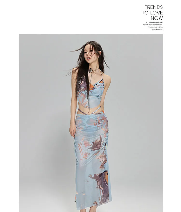Women's blue printed three-piece bikini set with triangle top featuring steel wire support and a detachable skirt.