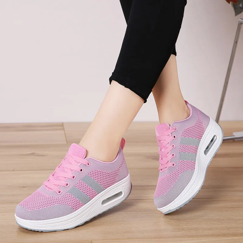 Women's solid colour flyknit platform casual shoes with a vulcanised air cushion sole and T-shaped ribbon.