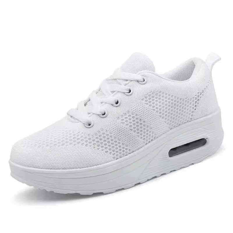 Women's solid colour flyknit platform casual shoes with a vulcanised air cushion sole and T-shaped ribbon.