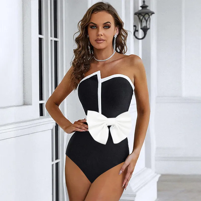 Women's black and white colour-block one-piece swimsuit with bow detail and tube top neckline