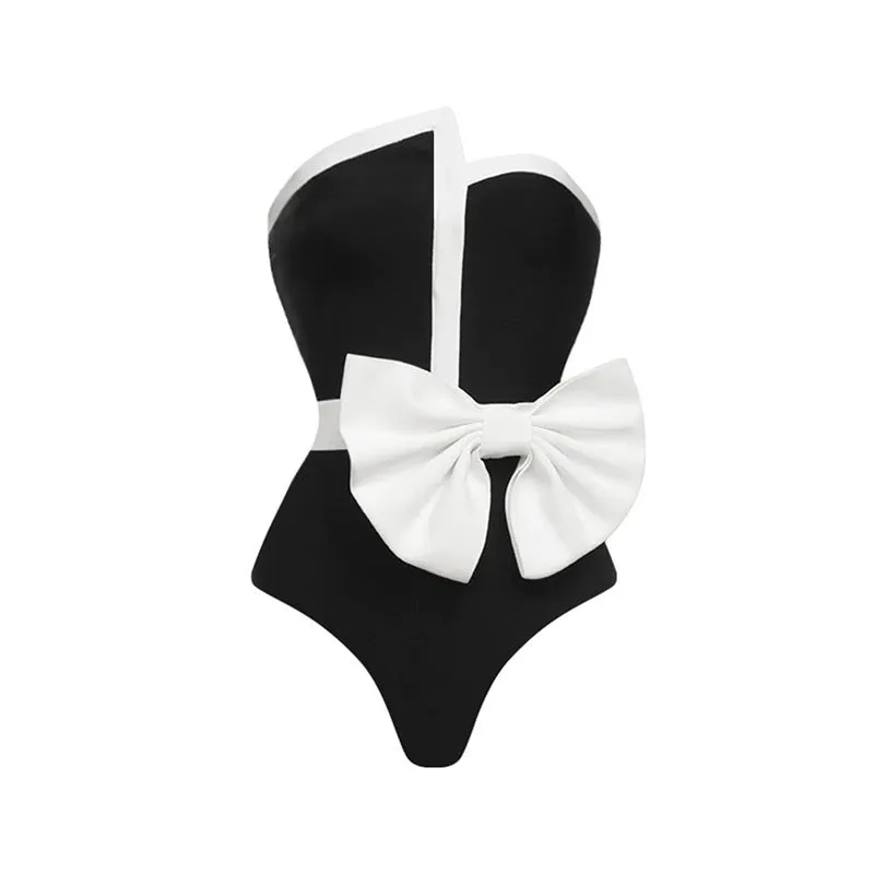 Women's black and white colour-block one-piece swimsuit with bow detail and tube top neckline