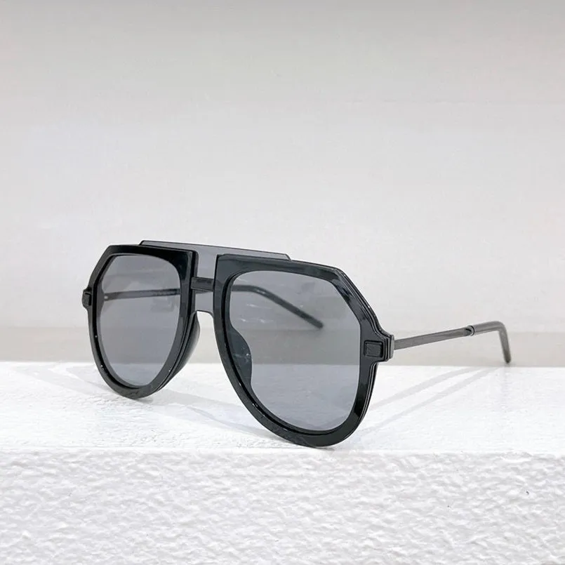 Black leopard print large frame sunglasses with elliptical shape on board material frame