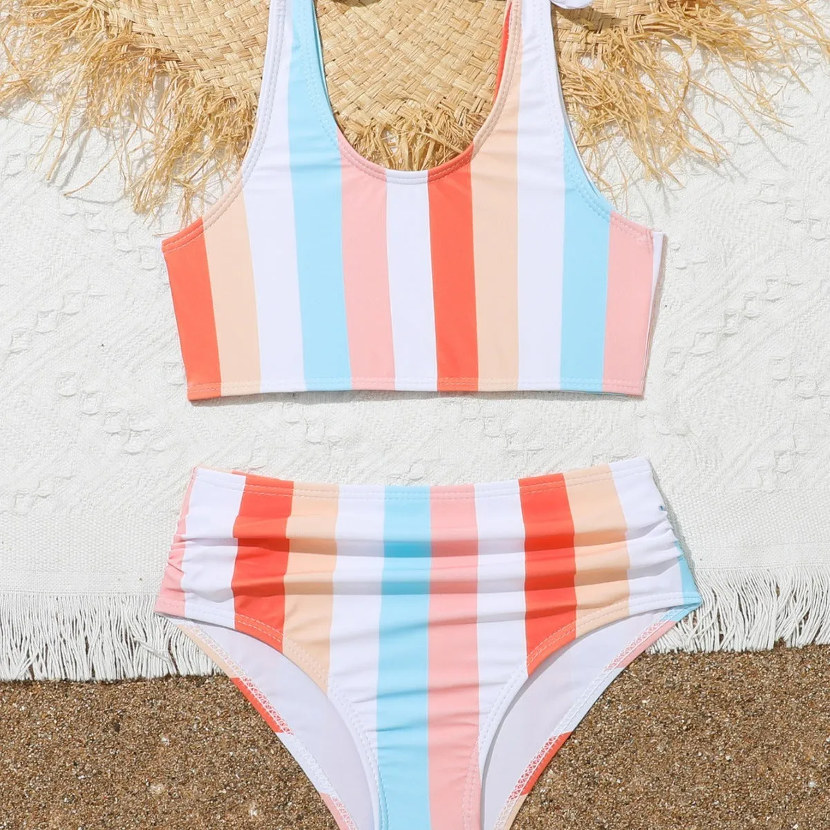 Girls' two-piece plaid print swimsuit with bra top and briefs for swimming.