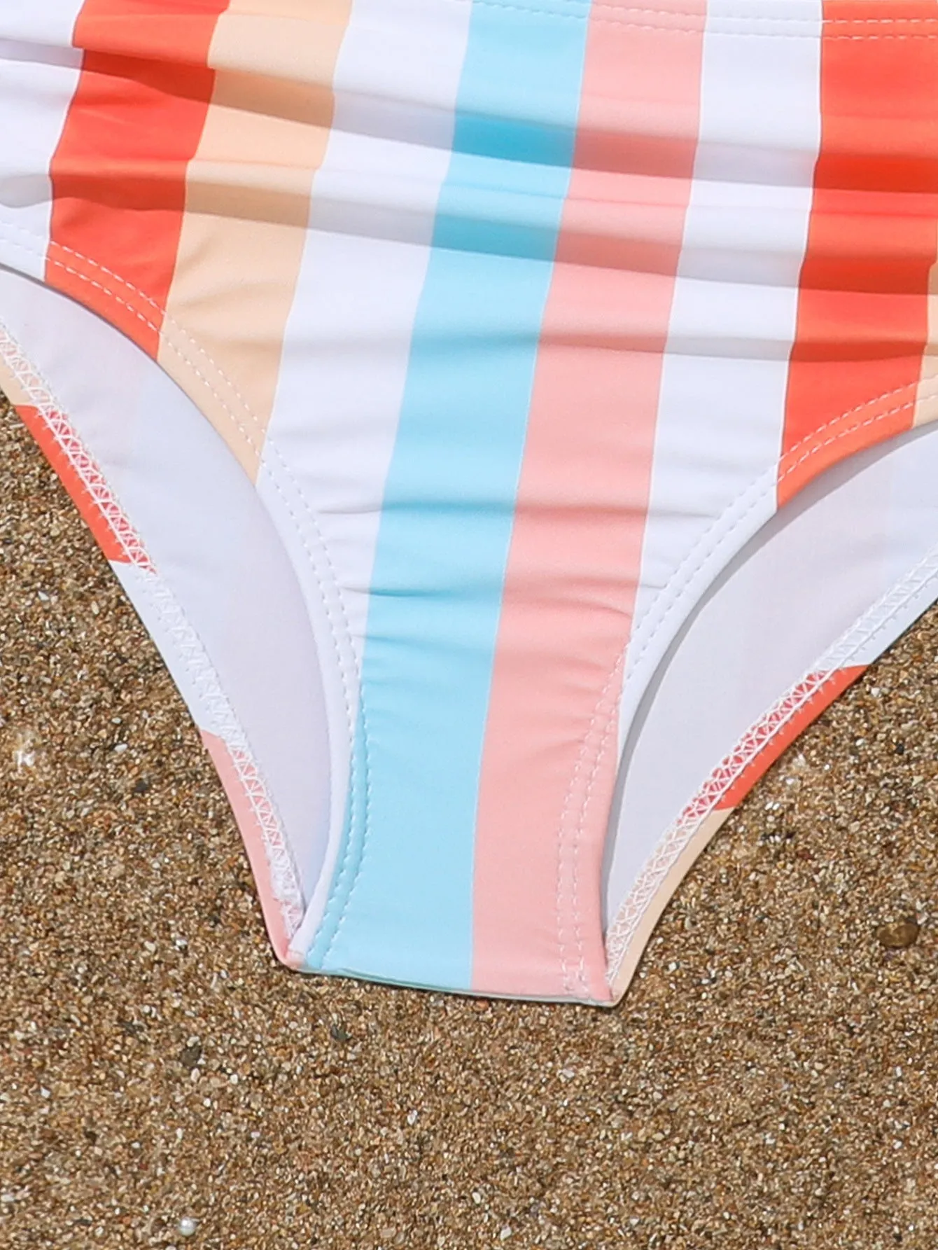 Girls' two-piece plaid print swimsuit with bra top and briefs for swimming.