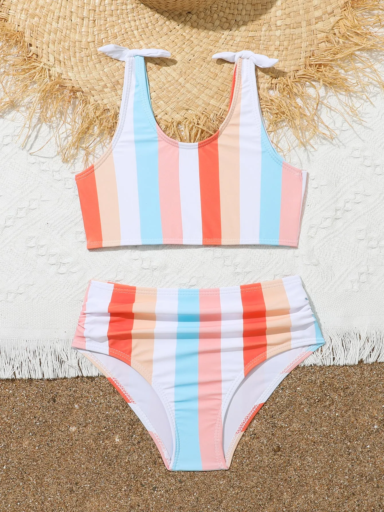Girls' two-piece plaid print swimsuit with bra top and briefs for swimming.