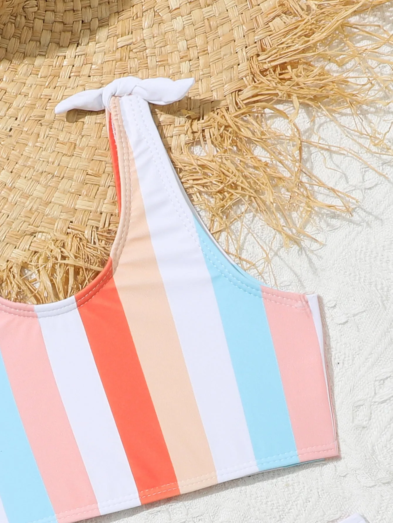 Girls' two-piece plaid print swimsuit with bra top and briefs for swimming.