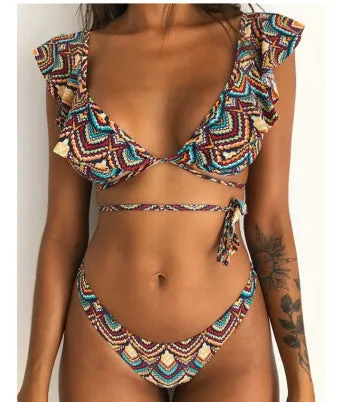 Yellow floral print split bikini swimsuit on a hanger, showing top and briefs.