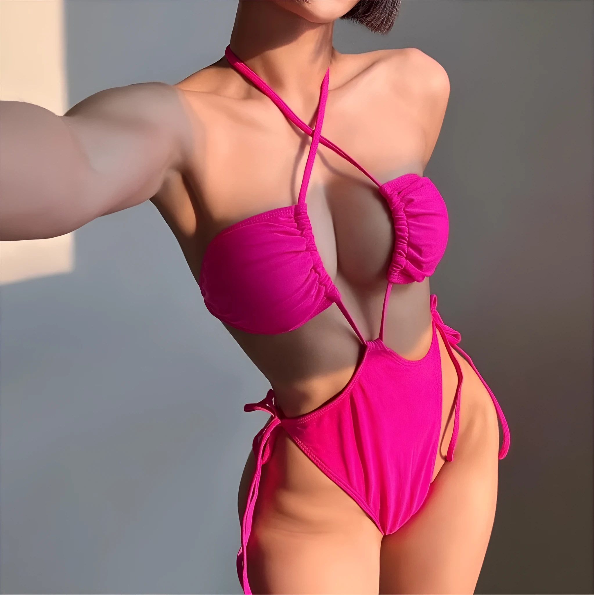 Women's solid colour one-piece swimsuit with an adjustable drawstring, shown in multiple colour options.