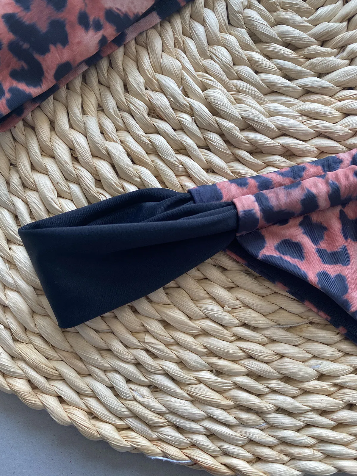 Women's leopard print and black bikini set with tube top and split-style briefs