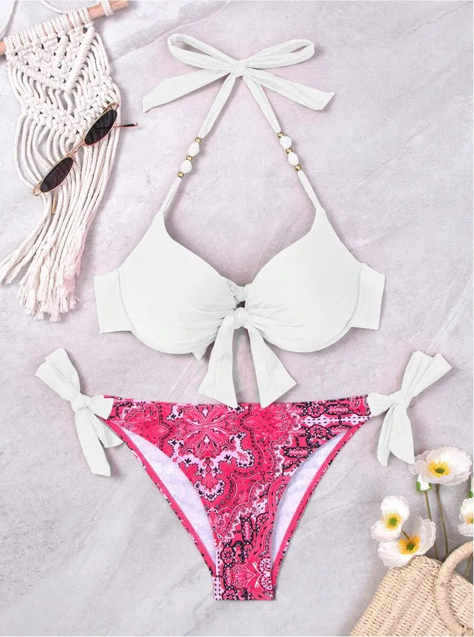 Ladies' striped and solid colour polyester bikini swimsuit set on hanger