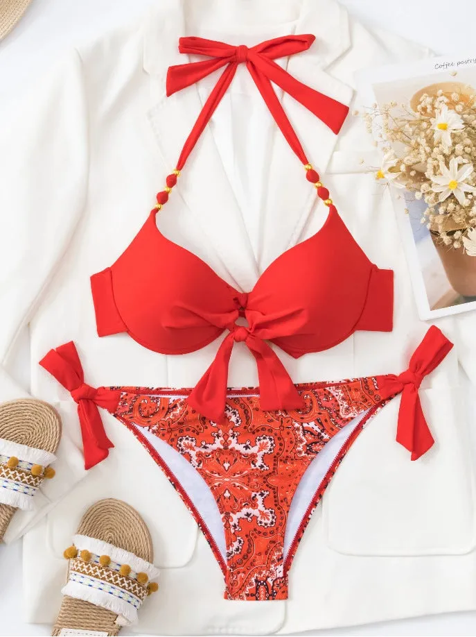 Ladies' striped and solid colour polyester bikini swimsuit set on hanger