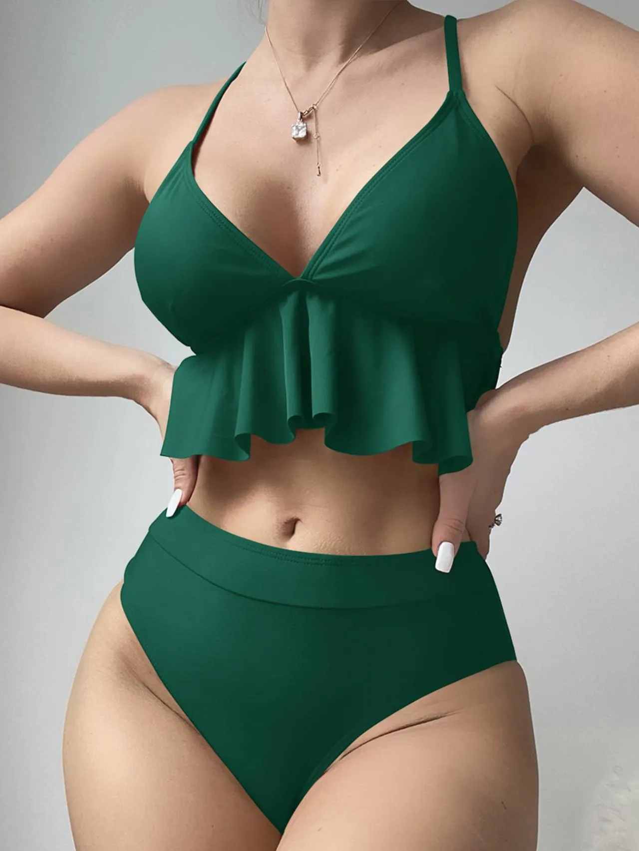 Women's solid colour bikini swimsuit in black, army green, brick red, or blue.