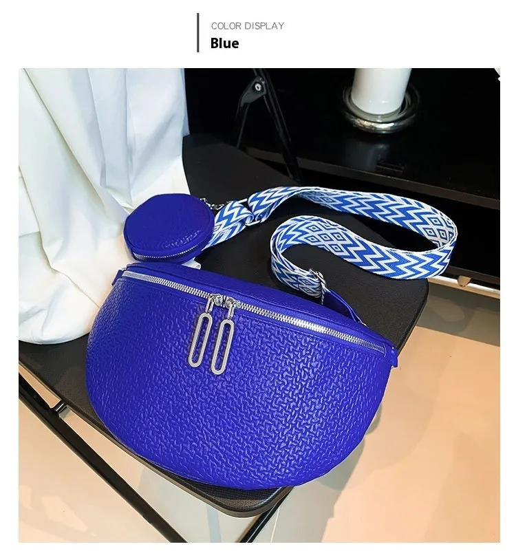 Solid colour women's crossbody bag with saddle lock zipper texture in a horizontal square clamshell shape.