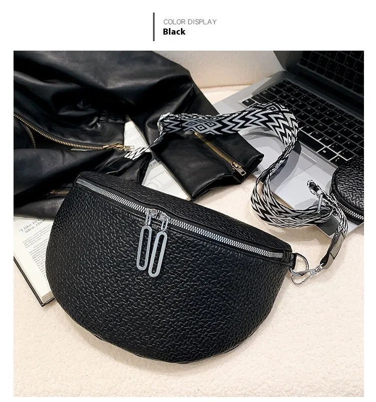 Solid colour women's crossbody bag with saddle lock zipper texture in a horizontal square clamshell shape.