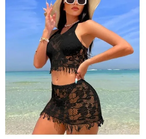 Women's white two-piece swimsuit with lace bikini top and tassel skirt beach cover-up