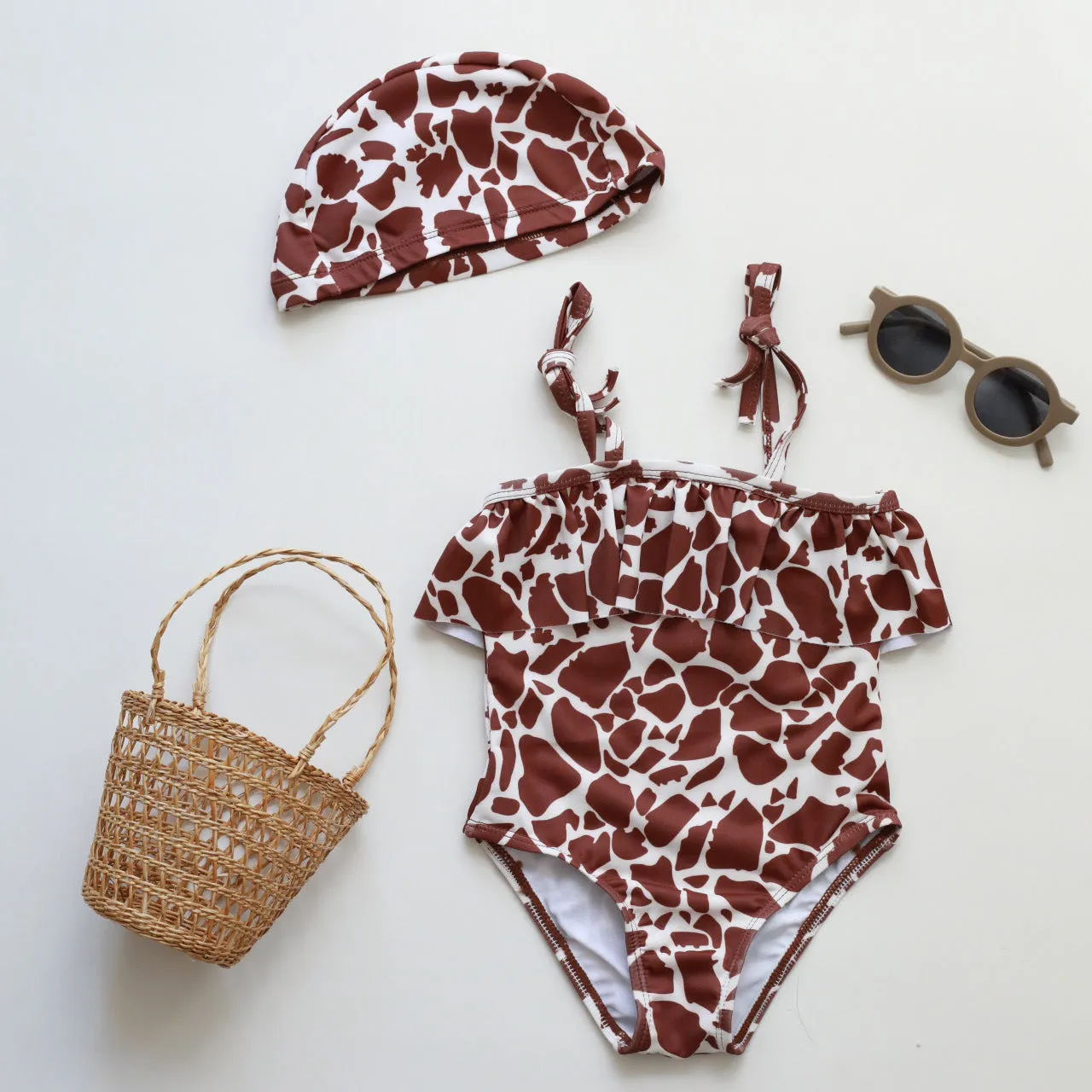 Girls' one piece swimsuit with high elasticity polyester fabric in floral and animal print designs