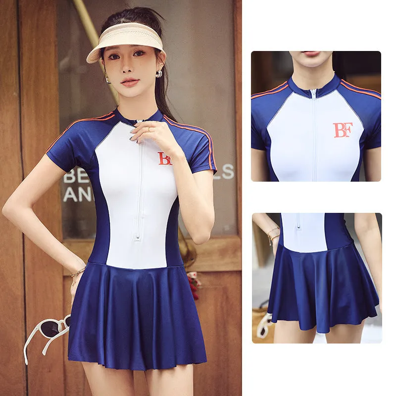 Conservative women's sports one-piece swimsuit in a colour-block pattern, shown in colour E92 or E93.