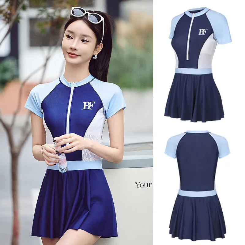 Conservative women's sports one-piece swimsuit in a colour-block pattern, shown in colour E92 or E93.