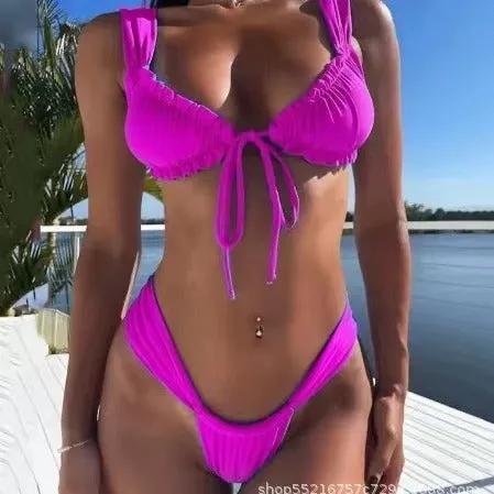 Women's solid colour lace-up bikini swimsuit shown in a selection of available colours.