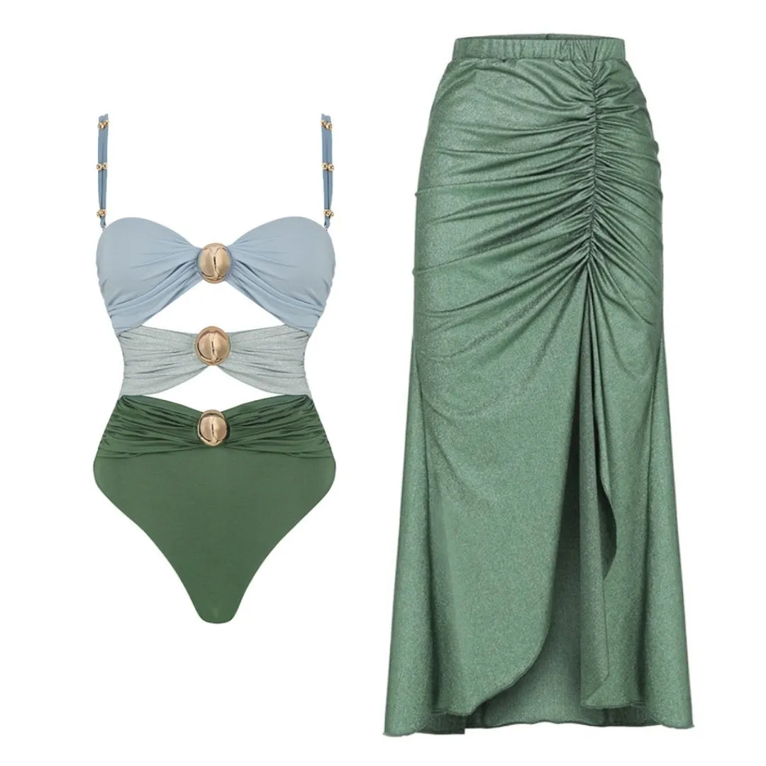 Green women's one-piece swimsuit with round buckle decoration and hollow out stitching on nylon fabric.
