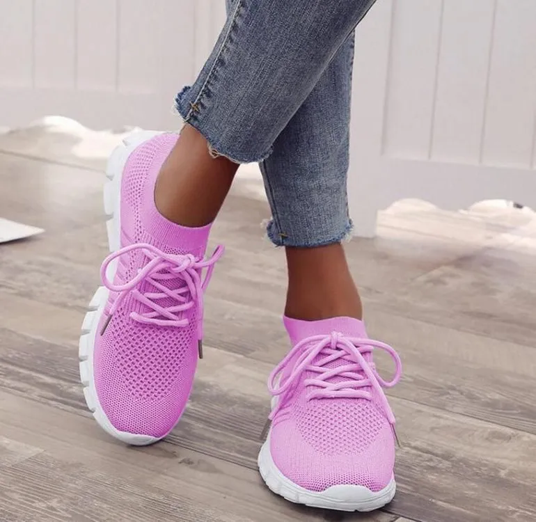 Women's breathable high-top lace-up platform sneaker in various colours on a casual background.