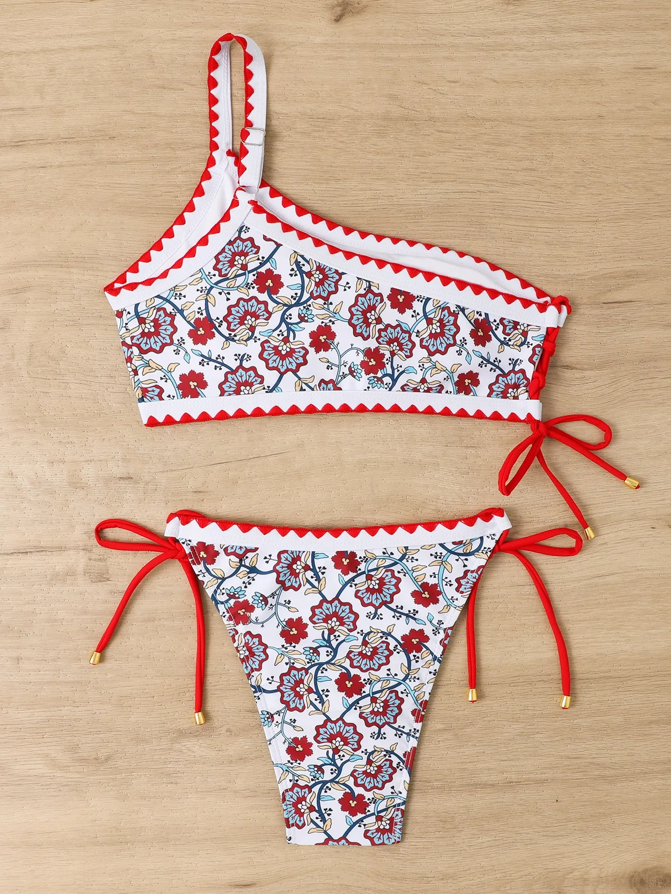 Women's blue and red one-shoulder floral bikini set with briefs-style bottom