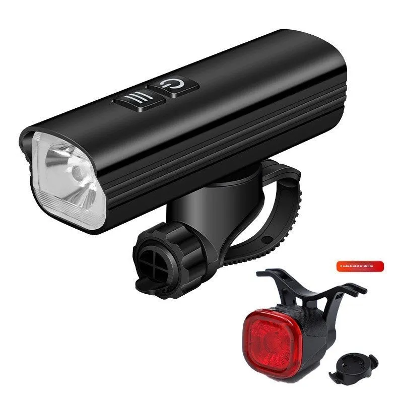 USB rechargeable bicycle headlight and taillight set with mounting bracket on a black background.